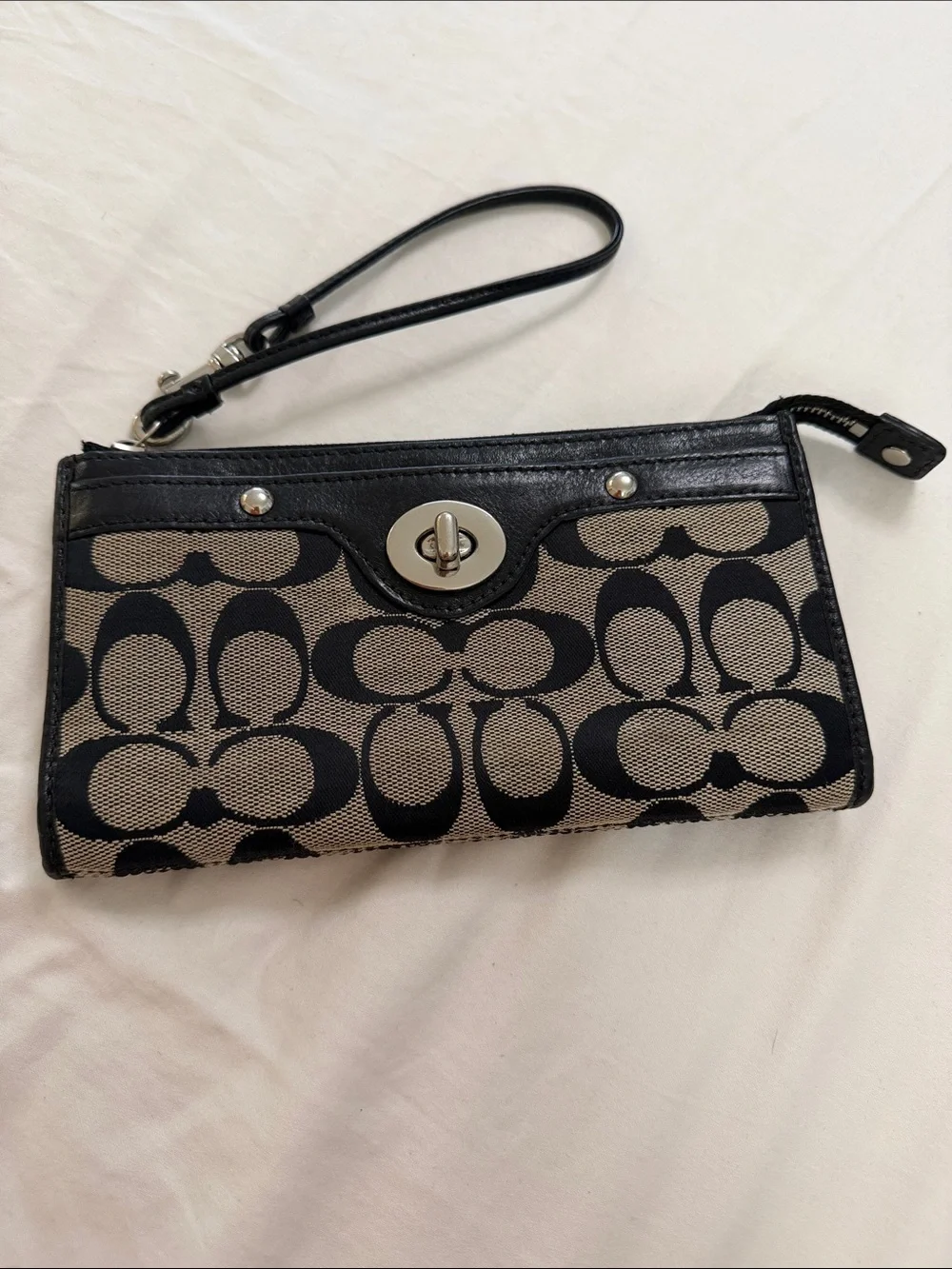 Coach Black and Tan Signature Turnlock Wristlet